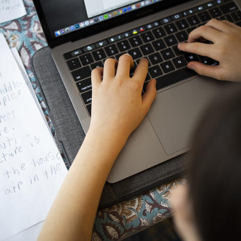 Student working on laptop