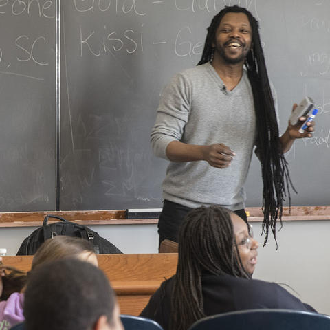 before visit hero, teacher talking to students